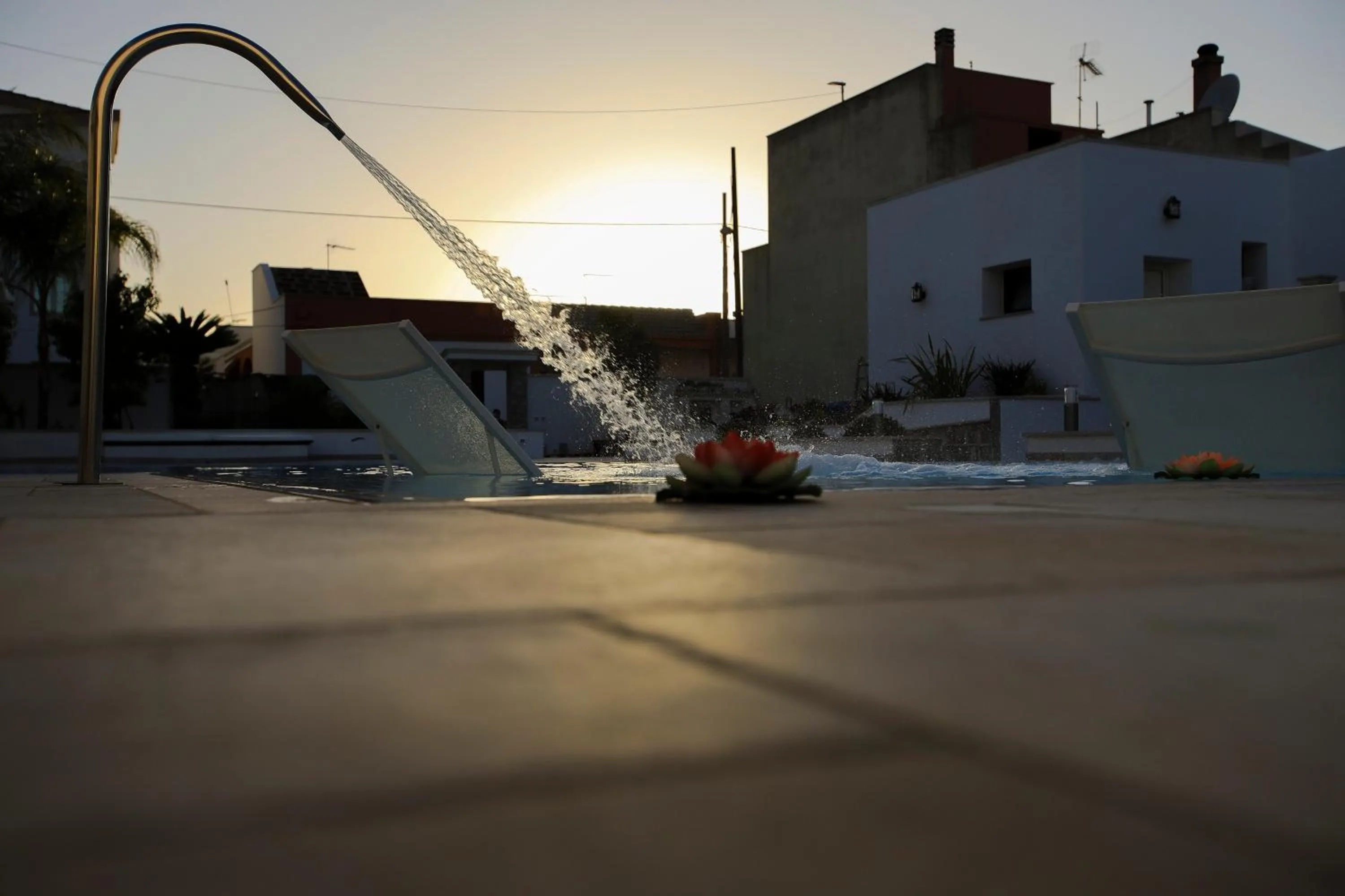 Sunset in Il Baiocco affittacamere piscina & SPA