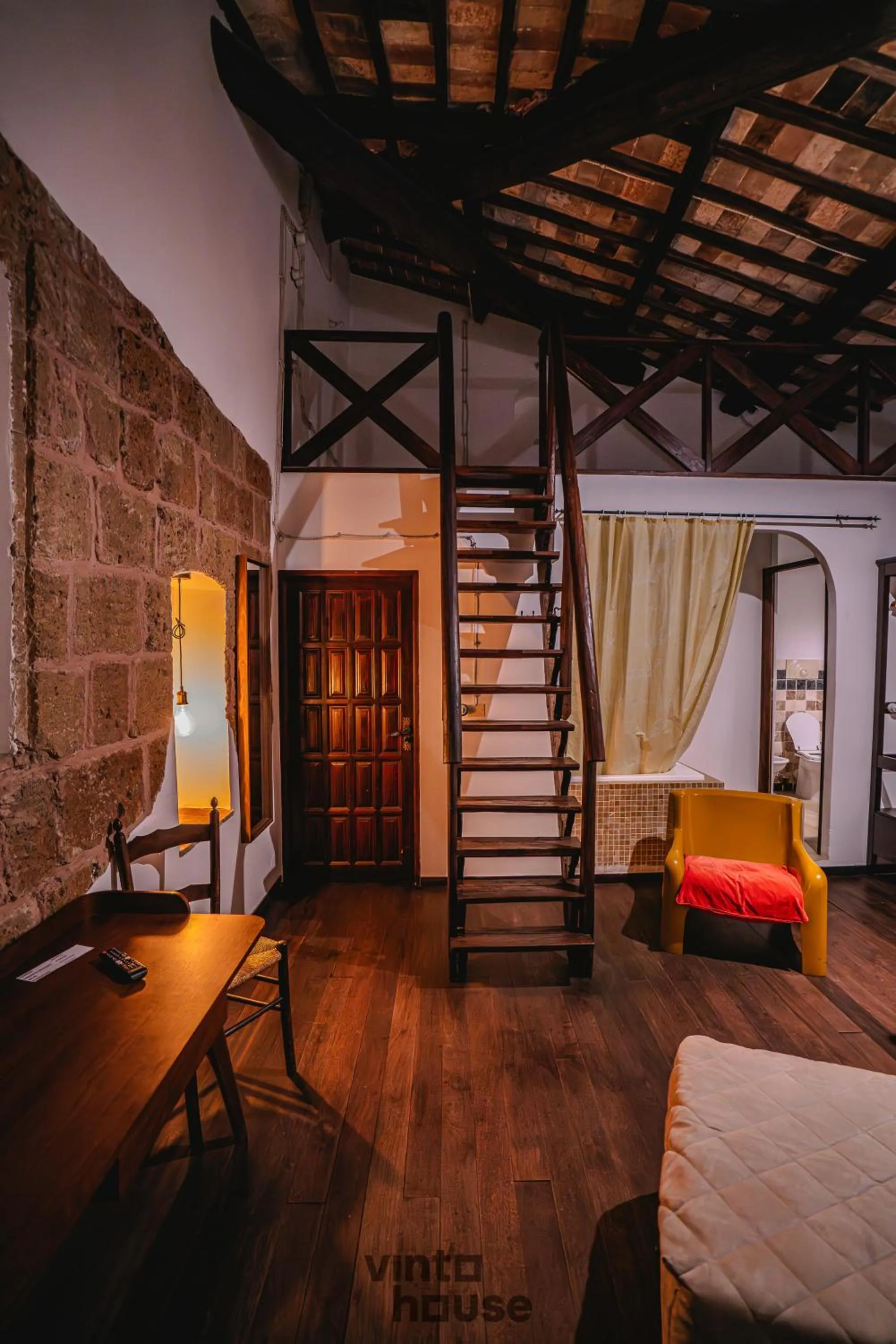 Seating area, Bed in Libera Mente Civita