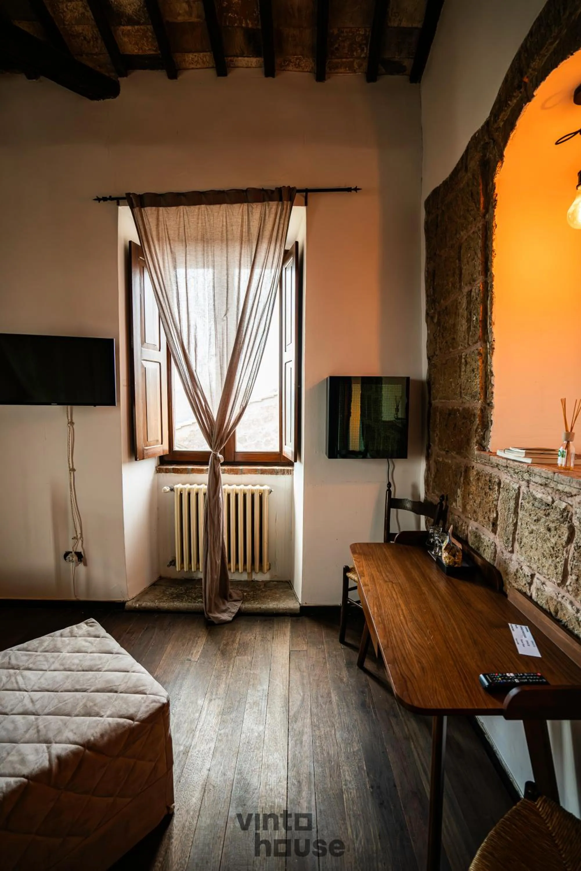 Seating area, Bed in Libera Mente Civita