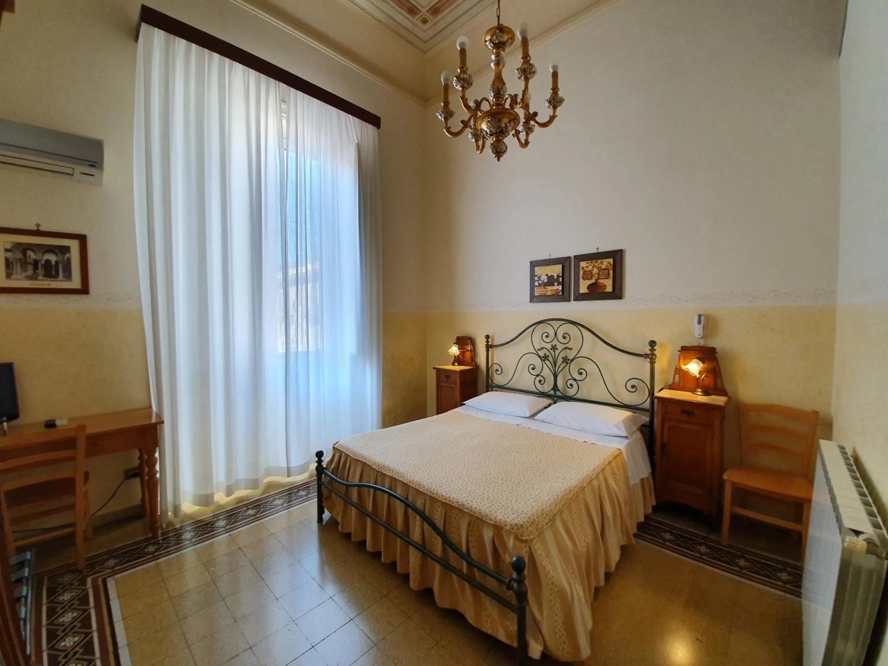 Photo of the whole room, Bed in Albergo Cavour
