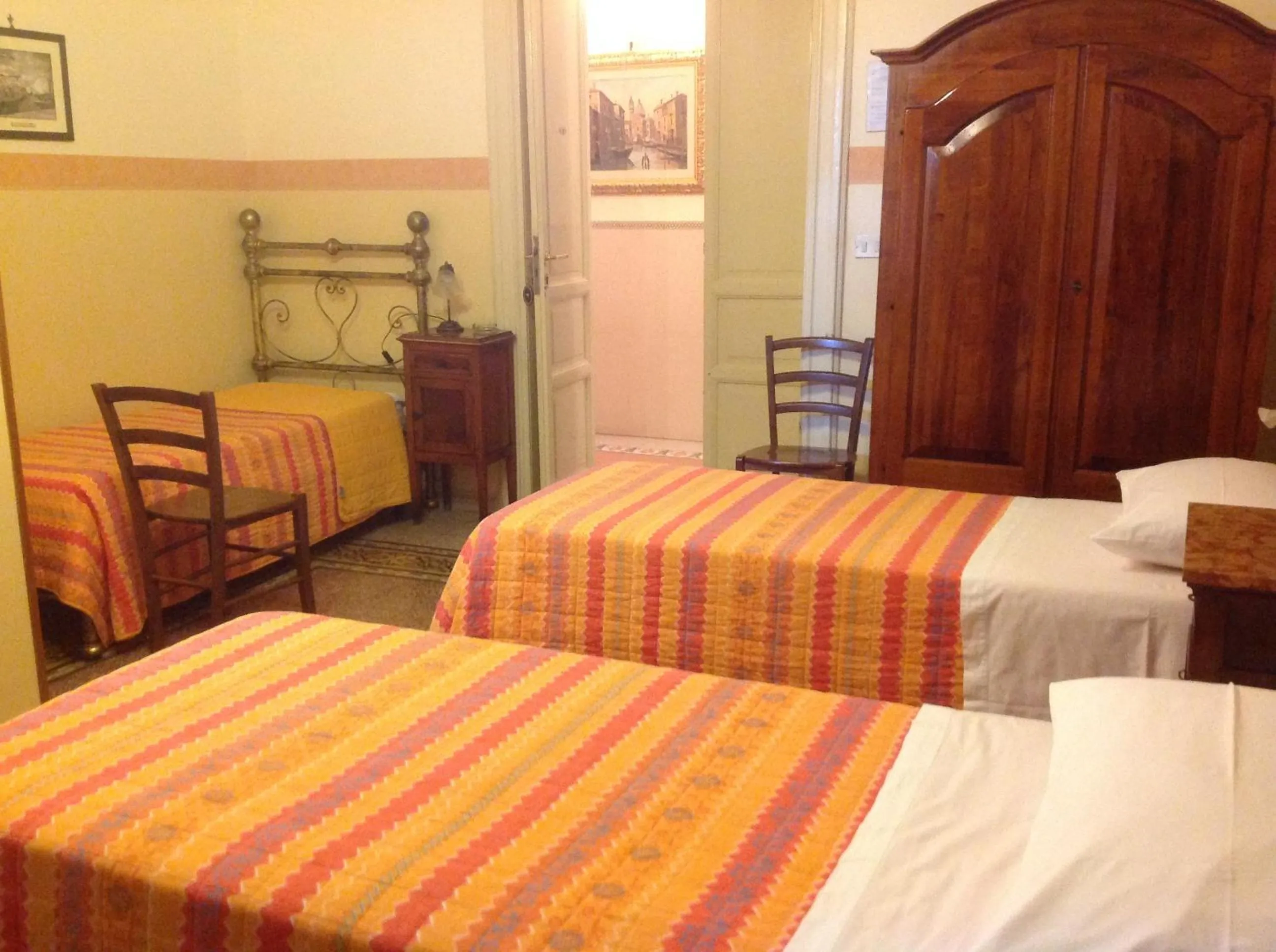 Photo of the whole room, Bed in Albergo Cavour