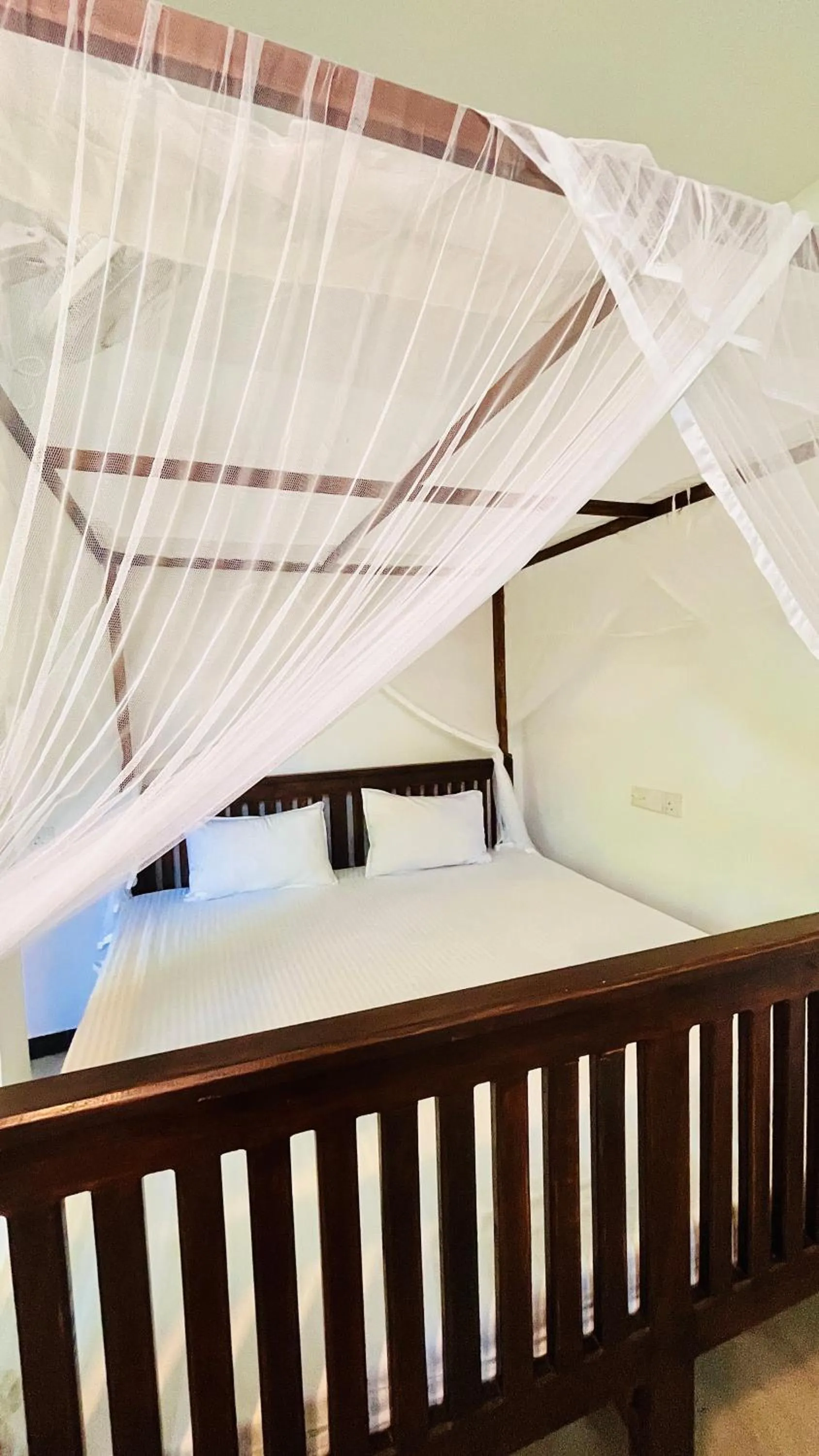 Bed in Wasana Ocean View Villa Mirissa
