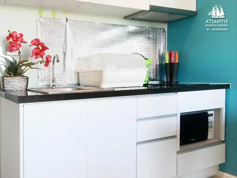 Text overlay, Kitchen/Kitchenette in Atlantis Condo & Water Park Pattaya By The Sea