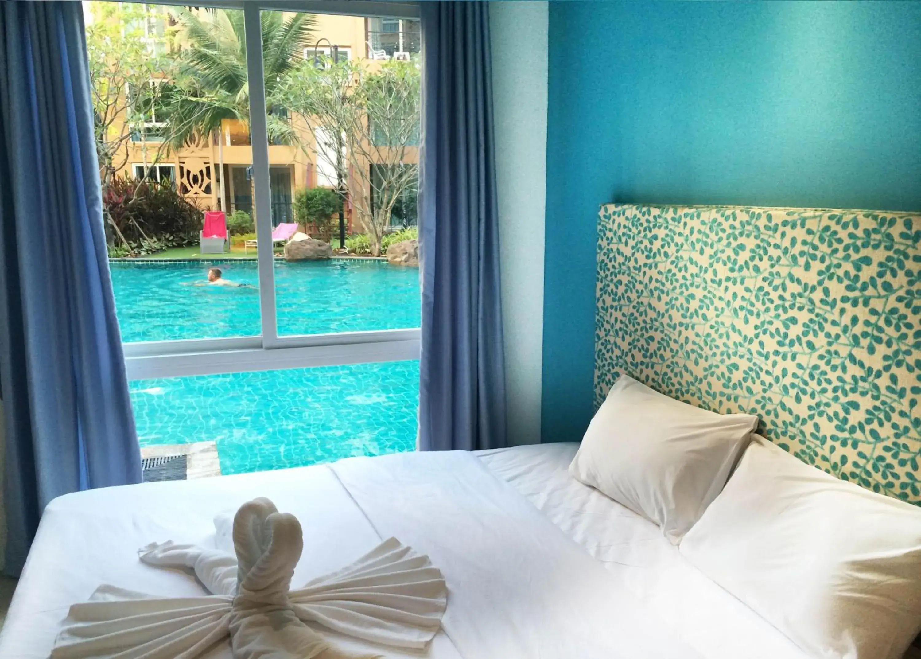 Bed, Garden View in Atlantis Condo & Water Park Pattaya By The Sea