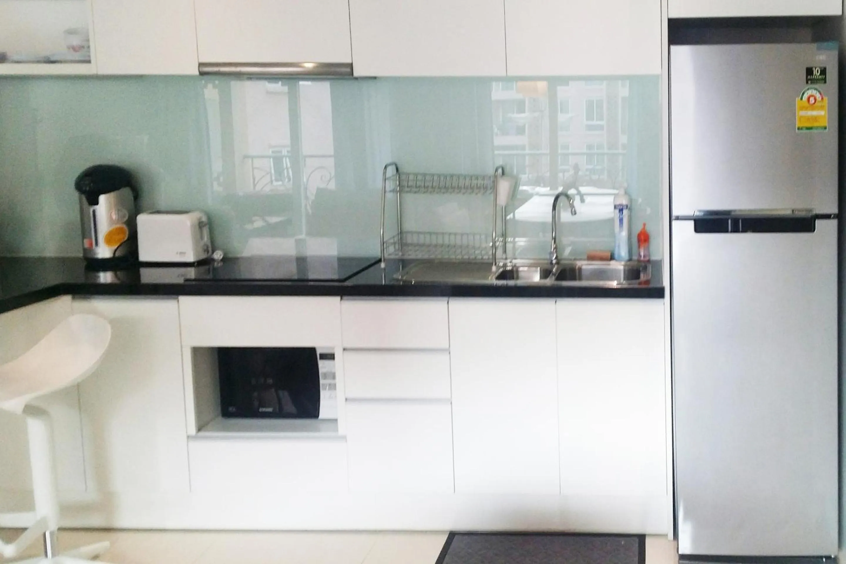 Kitchen or kitchenette in Atlantis Condo & Water Park Pattaya By the Sea