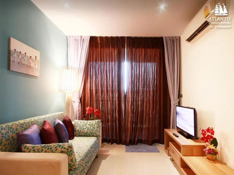 Text overlay in Atlantis Condo & Water Park Pattaya By the Sea