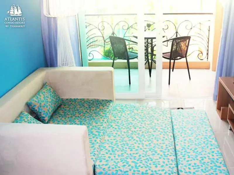 Text overlay, Seating Area in Atlantis Condo & Water Park Pattaya By The Sea
