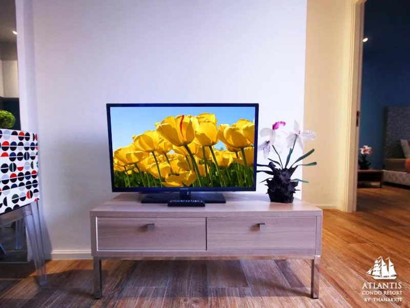 Text overlay in Atlantis Condo & Water Park Pattaya By the Sea