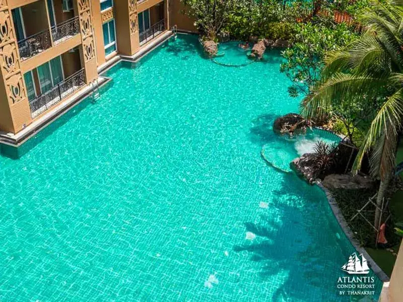 Text overlay, Swimming Pool in Atlantis Condo & Water Park Pattaya By The Sea