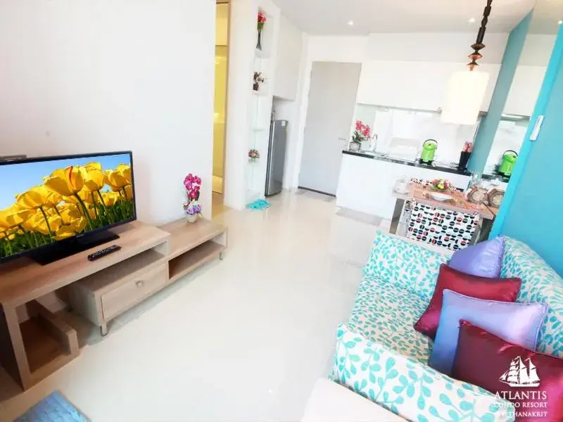 Text overlay, TV/Entertainment Center in Atlantis Condo & Water Park Pattaya By The Sea