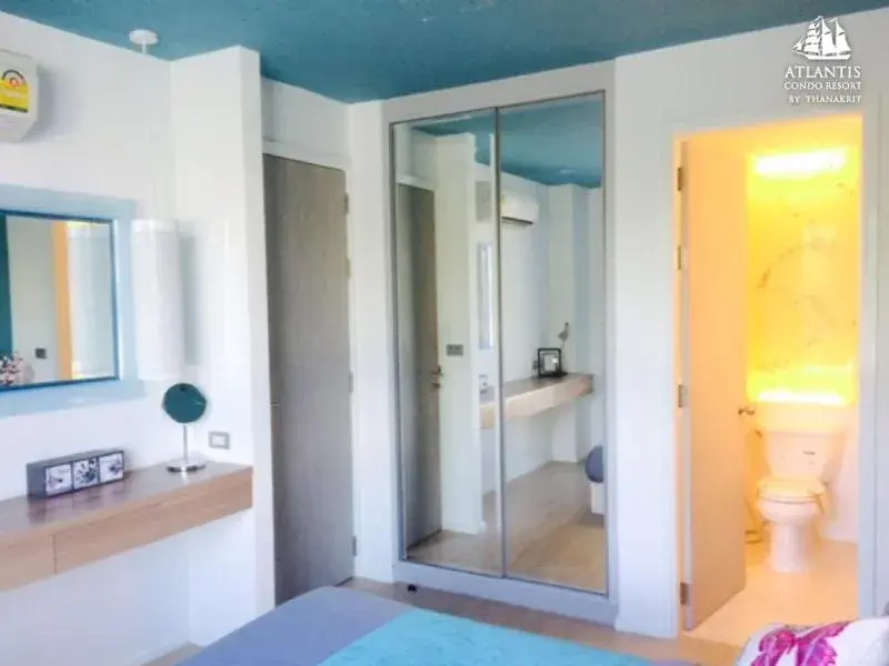 Text overlay, Bathroom in Atlantis Condo & Water Park Pattaya By The Sea