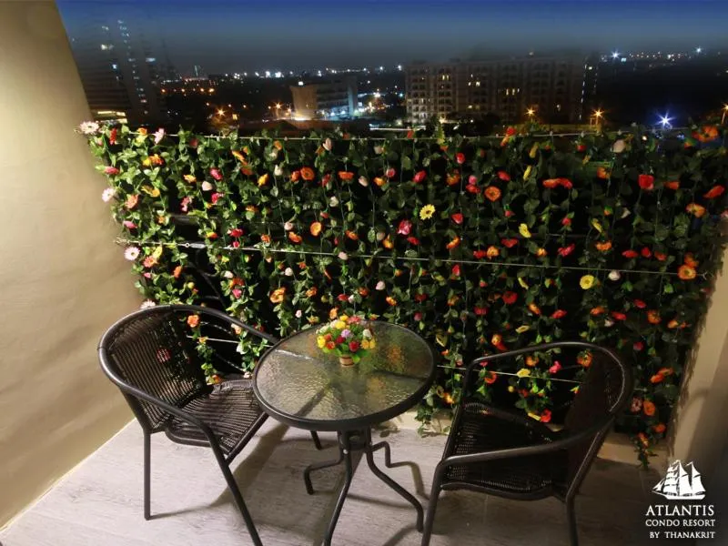 Text overlay in Atlantis Condo & Water Park Pattaya By the Sea