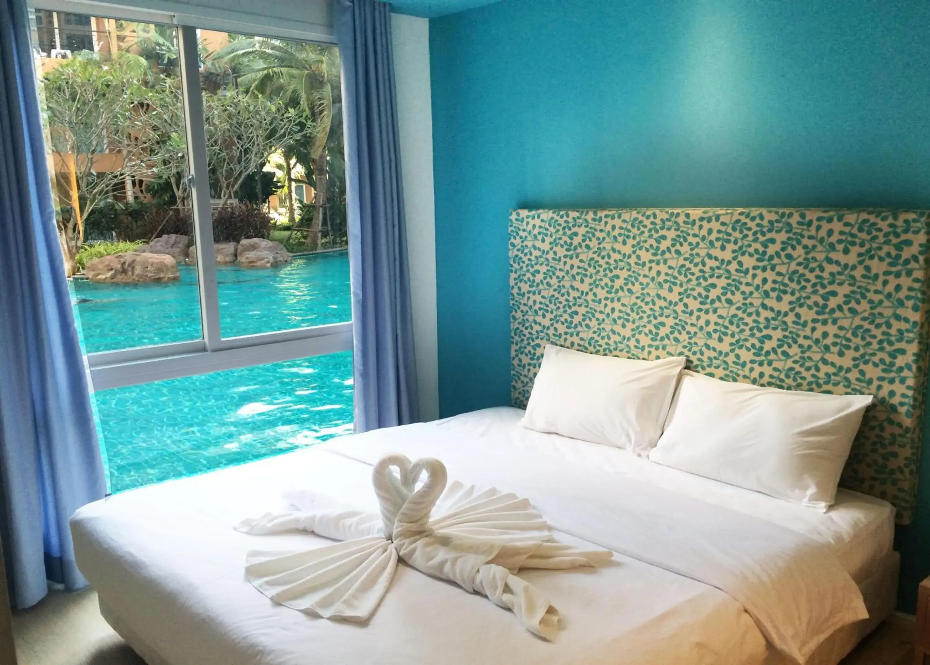 Bed, Garden View in Atlantis Condo & Water Park Pattaya By The Sea