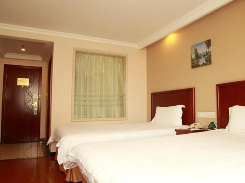 Bed in GreenTree Inn Beijing Xisanqi Bridge Business Hotel