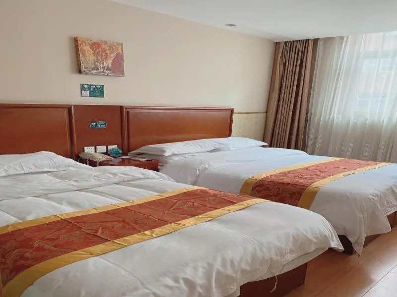 Bed in GreenTree Inn Beijing Shunyi Xinguozhan Express Hotel