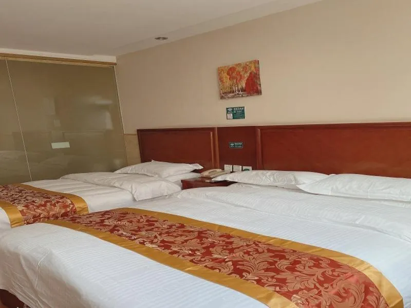 Bed in GreenTree Inn Beijing Shunyi Xinguozhan Express Hotel