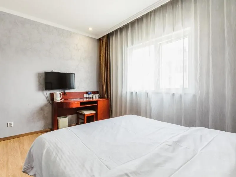 Bed in GreenTree Inn Shanghai Huinan Jinghai Road Express Hotel