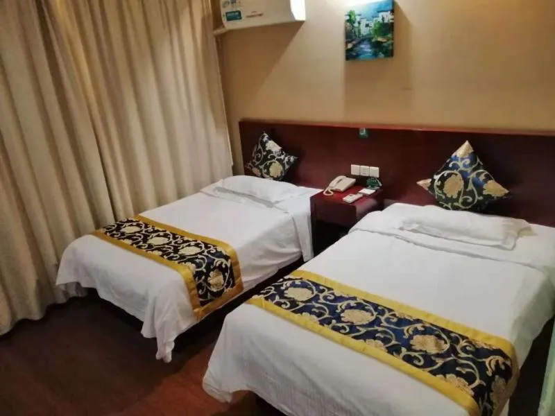Bed in GreenTree Inn Tianjin Beiyang Bridge Business Hotel