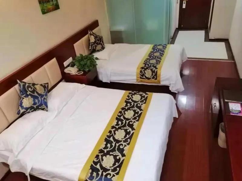 Bed in GreenTree Inn Tianjin Beiyang Bridge Business Hotel
