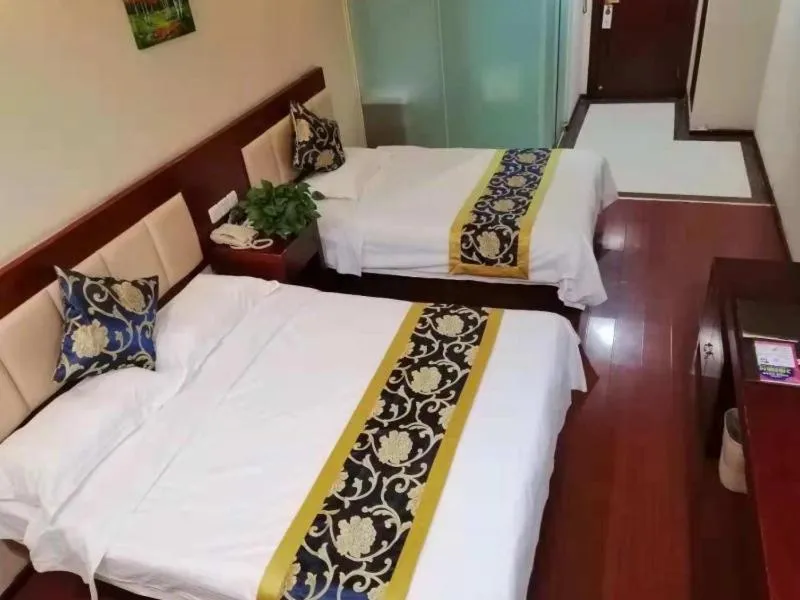 Bed in GreenTree Inn Tianjin Beiyang Bridge Business Hotel