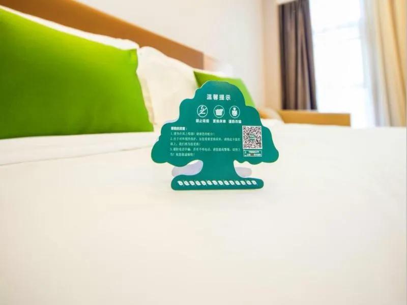 Bed in GreenTree Inn Tianjin Xiqing Development Zone Renrenle Square Express Hotel