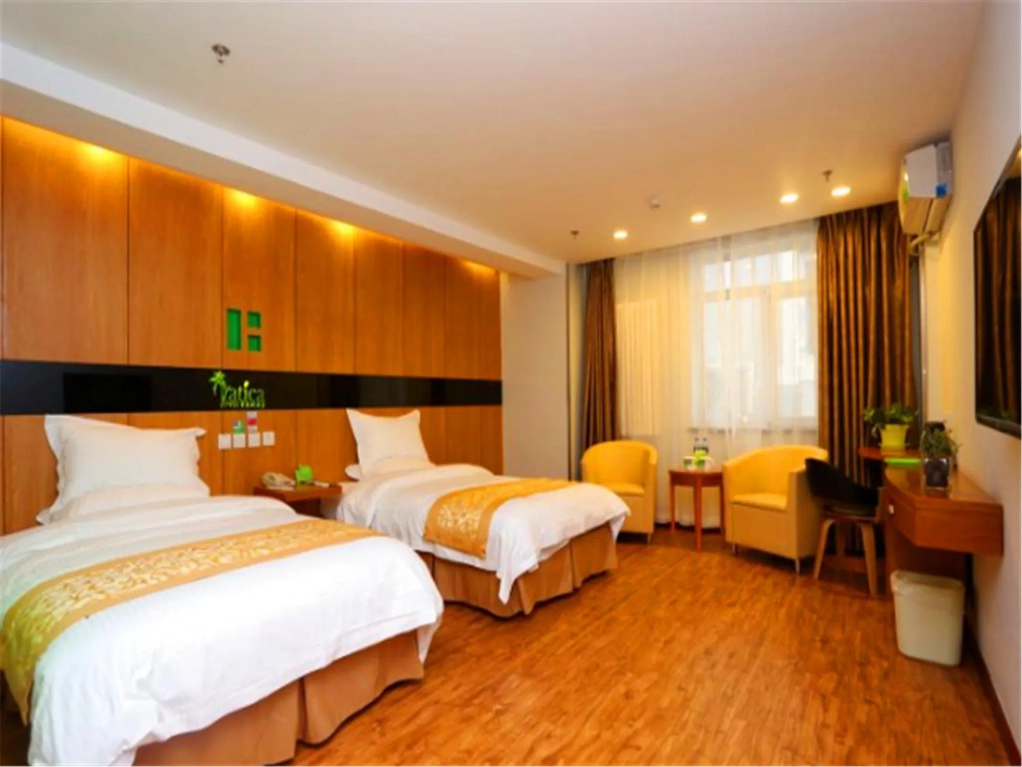 Seating area, Bed in Vatica Tianjin Dagang Xuefu Road University Town Hotel