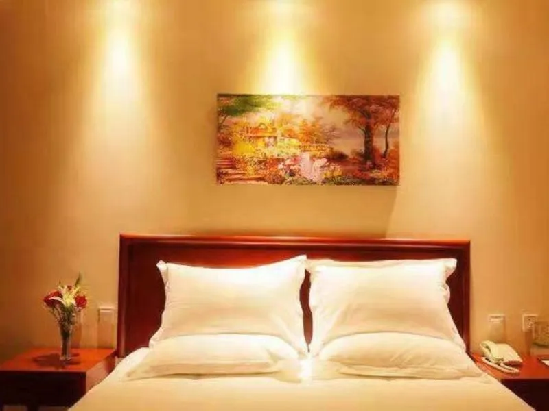 Bed in GreenTree Inn Inner Mongolia Chifeng Linxi Ronglin Homeland Express Hotel