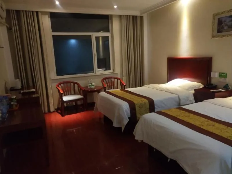 Bed in GreenTree Inn Shandong Heze Development Zone Guangzhou Road Yuehua Express Hotel