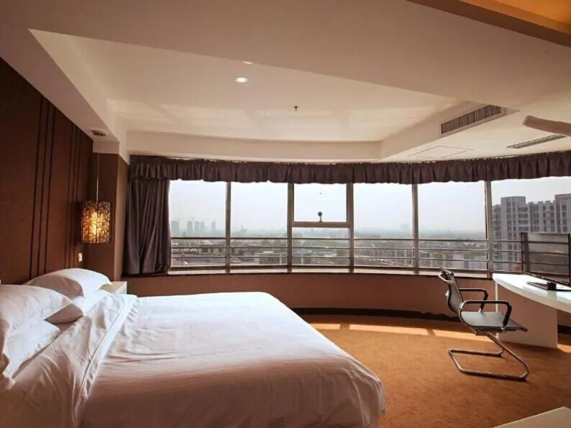 Bed in GreenTree Inn Shandong Zibo Railway Station Jinjing Avenue Business Hotel