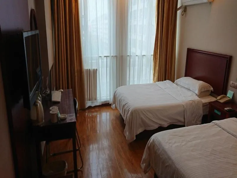 Bed in GreenTree Inn Shandong Jining Jinxiang Kuixing Road Express Hotel