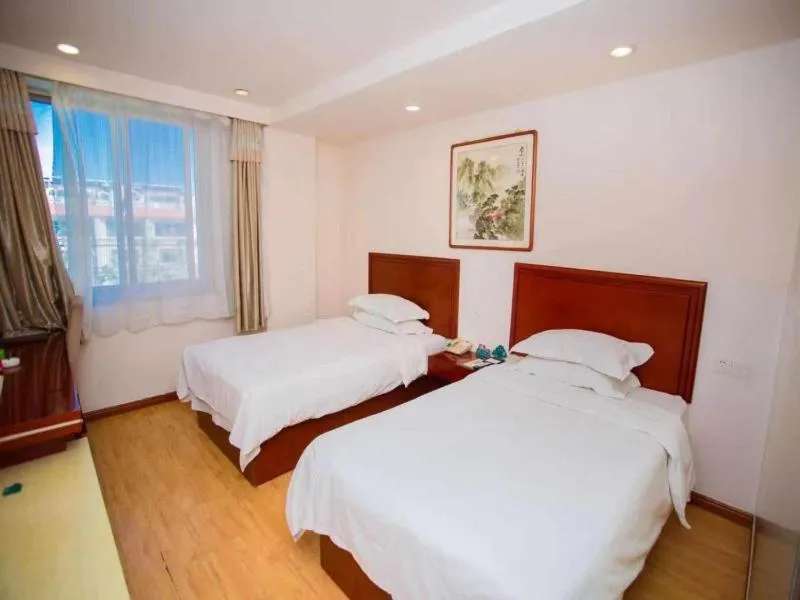 Bed in GreenTree Inn Shandong Binzhou Wanda Plaza Huangheshilu Express Hotel