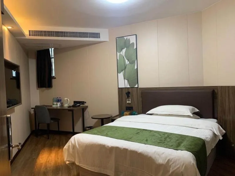 Bed in GreenTree Inn Anhui Lu’an Huoshan Yingjia Avenue Business Hotel