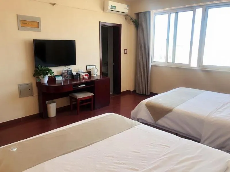 Bed in GreenTree Inn Shandong Weihai Wendeng Darunfa Business Hotel