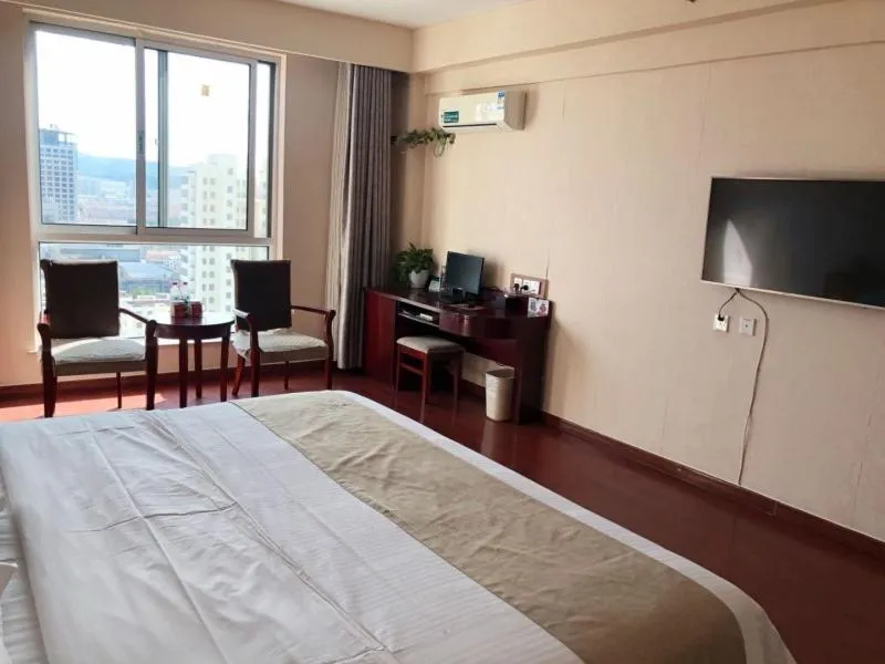 Bed in GreenTree Inn Shandong Weihai Wendeng Darunfa Business Hotel