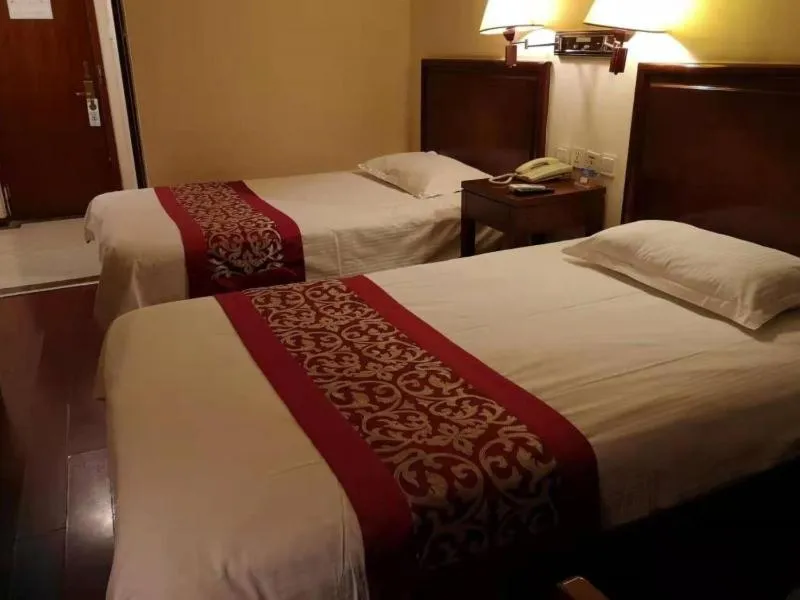 Bed in GreenTree Inn Shandong Rizhao University City Express Hotel