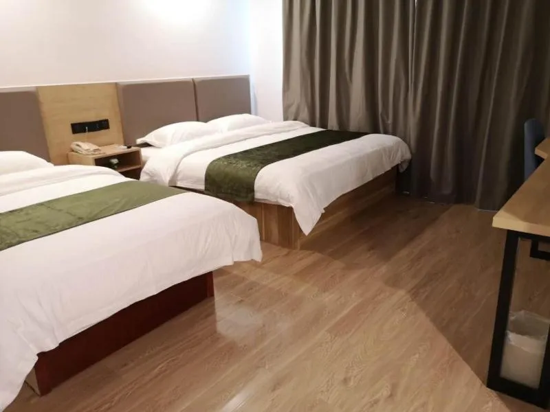 Bed in GreenTree Inn Shandong Rizhao University City Express Hotel