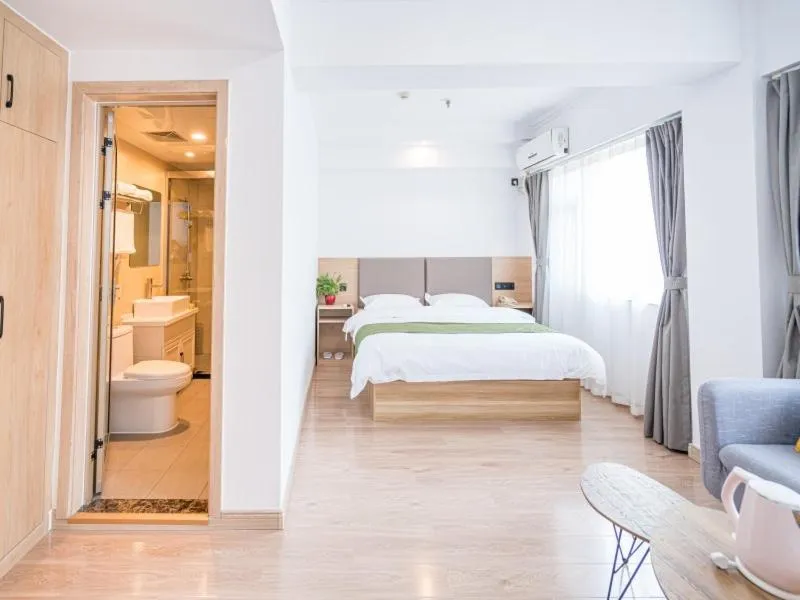 Bed in GreenTree Inn Shandong Rizhao University City Express Hotel