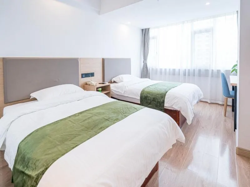 Bed in GreenTree Inn Shandong Rizhao University City Express Hotel