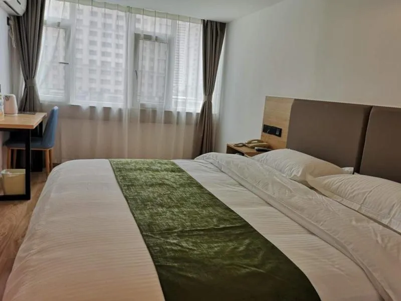 Bed in GreenTree Inn Shandong Rizhao University City Express Hotel