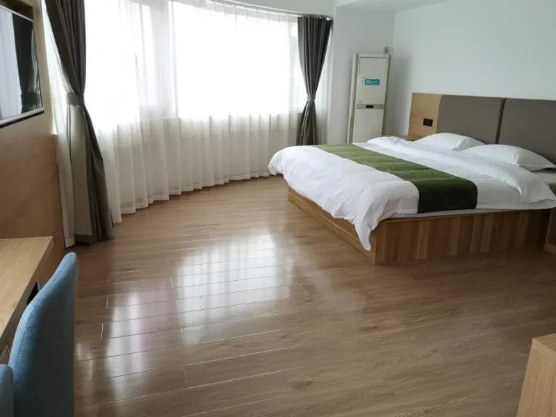 Bed in GreenTree Inn Shandong Rizhao University City Express Hotel