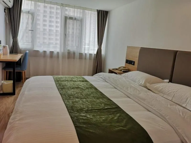 Bed in GreenTree Inn Shandong Rizhao University City Express Hotel