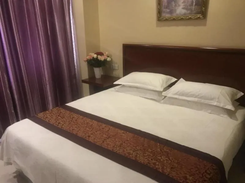 Bed in GreenTree Inn Shandong Liaocheng Town Dongchang Road Zhuanpan Business Hotel