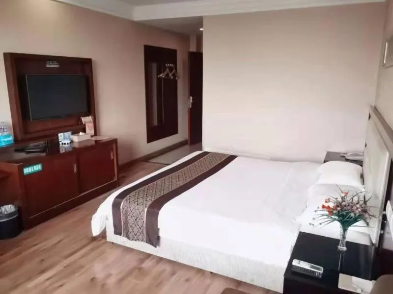 Bed in GreenTree Inn Hubei Huanggang Hong An Wal-Mart Plaza Business Hotel