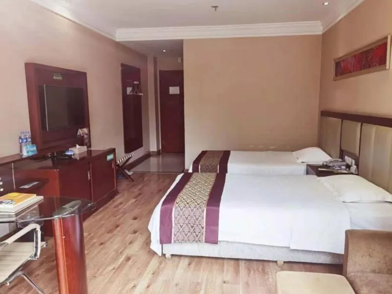 Bed in GreenTree Inn Hubei Huanggang Hong An Wal-Mart Plaza Business Hotel