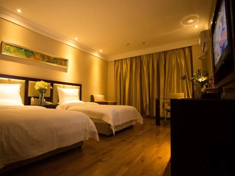 Bed in GreenTree Inn Hubei Huanggang Hong An Wal-Mart Plaza Business Hotel