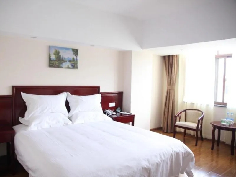 Bed in Greentree Inn Yunnan Lijiang Railway Station Yuxing Road Express Hotel