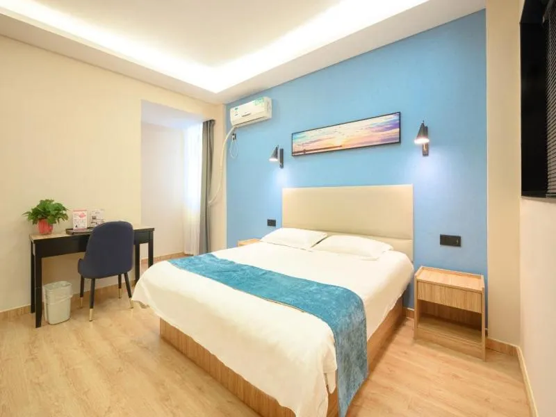 Bed in GreenTree Inn Henan Kaifeng Gulou Square Express hotel