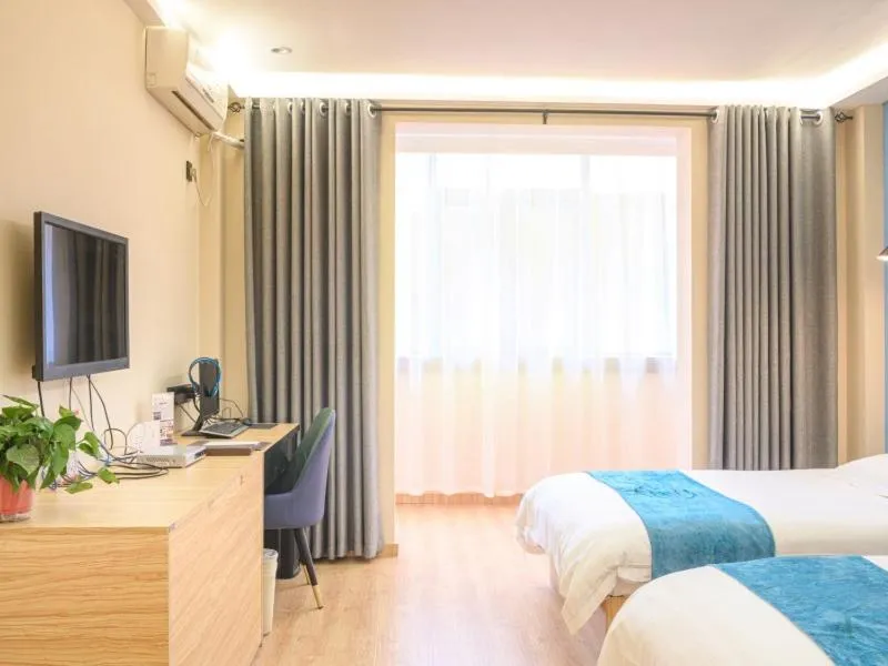 Bed in GreenTree Inn Henan Kaifeng Gulou Square Express hotel