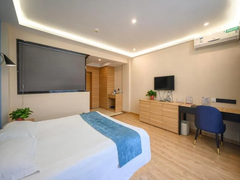 Bed in GreenTree Inn Henan Kaifeng Gulou Square Express hotel