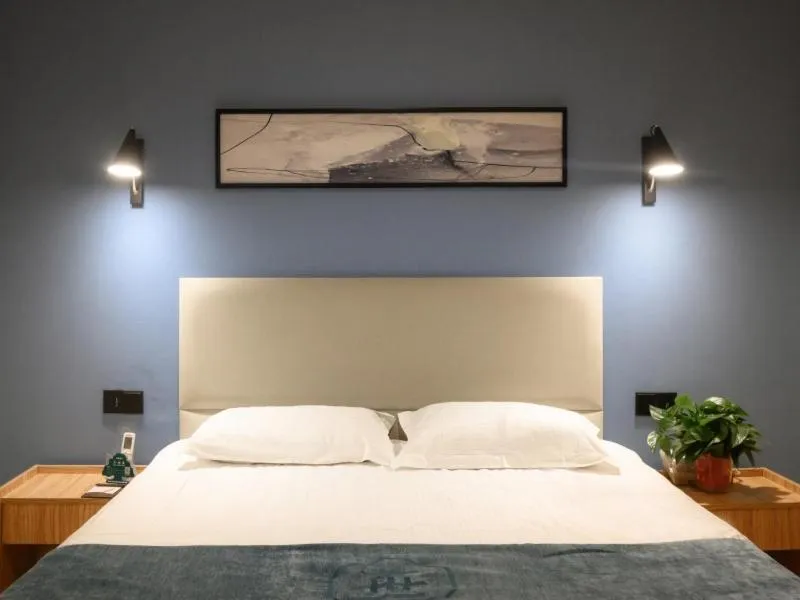 Bed in GreenTree Inn Henan Kaifeng Gulou Square Express hotel